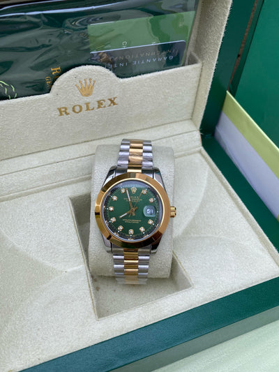 Rolex Oyster Perpetual Datejust  (Green with Diamond Hours)