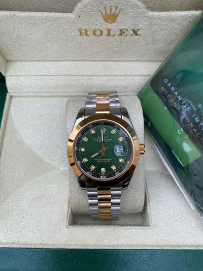 Rolex Oyster Perpetual Datejust  (Green with Diamond Hours)