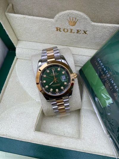 Rolex Oyster Perpetual Datejust  (Green with Diamond Hours)